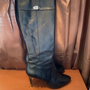 A pair of coach boots